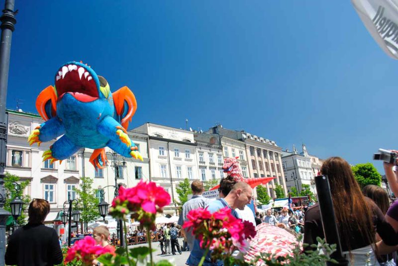 Dragon parade in Main Square Krakow Poland