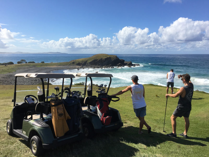 Golf carts overlooking Crescent Head Golf Course