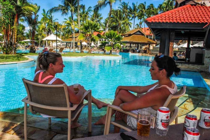 Skye and Sarah enjoying the pool with a few Bintangs