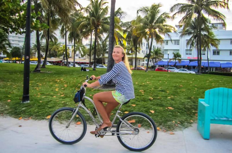 Kynie on a bike in Miami Beach-sm