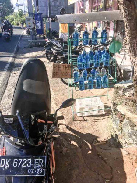 Filling the scooter up with fuel in Bali