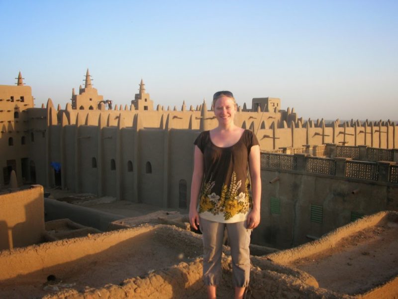 Thea in front of the Great Mosque of Djenné