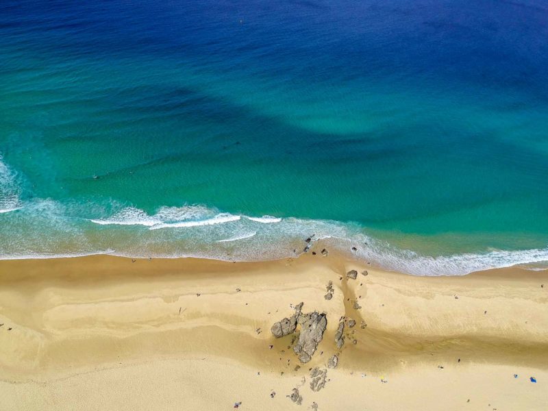 Redhead Beach rock and lifeguard tower by drone