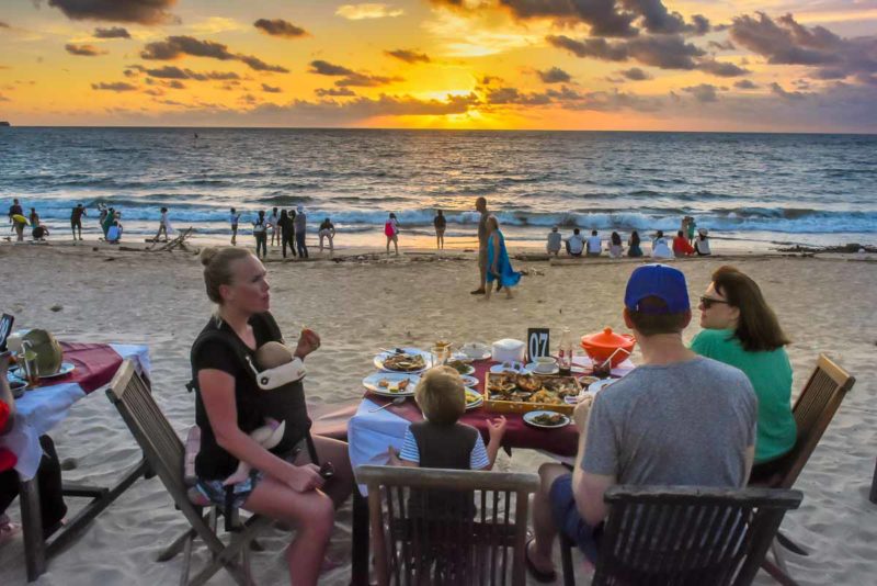 Sunset over dinner at Jimbaran Bay Beach