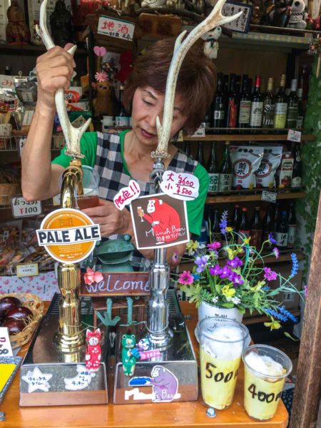 Ordering a beer in a roadside Minoo cafe