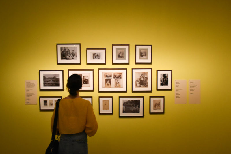 Phoebe enjoying the photography exhibit at the Peranakan Museum