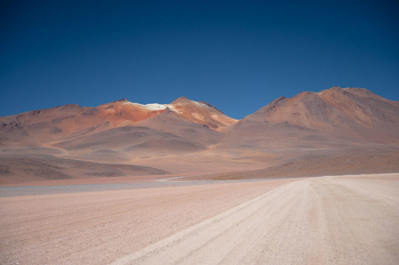 The high altitude gravel highway to Chile. The colours are caused by minerals in the rocks.